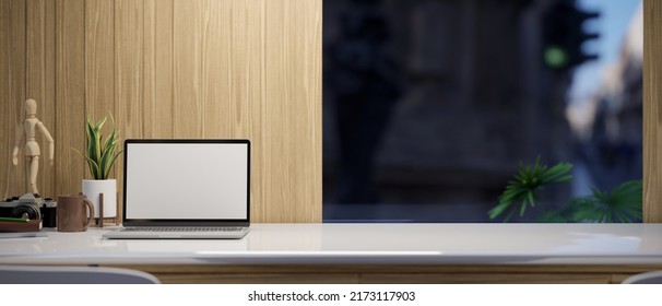 Modern Workspace Design With Notebook Laptop White Screen Mockup, Decor Plant, Accessories And Copy Space For Montage On Modern White Tabletop Against The Window. 3d Rendering, 3d Illustration