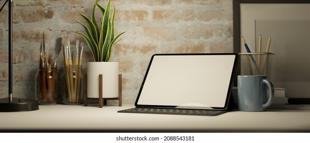 Modern Workspace With Digital Tablet Or Touchpad Mockup, Painting Tools,  Stationery, Decors On Table Over Brick Wall. 3d Rendering, 3d Illustration