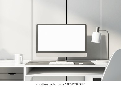 Monochrome Style Home Workplace With Blank White Computer Monitor On White Table At Light Wall Background. Mock Up. 3D Rendering