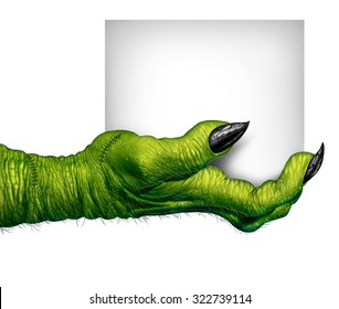 Monster hand holding a sign as zombie fingers with  blank card as a creepy halloween or scary symbol with textured green skin wrinkled scary fingers and stitches isolated on a white background - Powered by Shutterstock