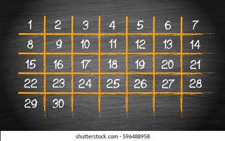 Monthly Calendar with 30 days on chalkboard background
