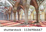 Moroccan columns with arches. Moroccan patterns on arches in the interior. The Nasir ol Molk Mosque. Great hall in Moroccan style. 3D Illustration.