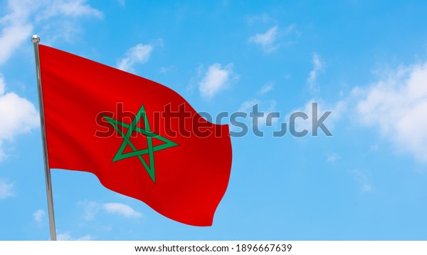 Morocco\
flag on pole. Blue sky. National flag of\
Morocco