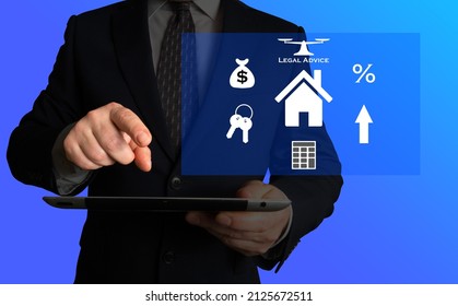 Mortgage and key related terms and corresponding illustrative images. Businessman holding a table or a phone looking at a screen displaying mortgage and real estate related images.