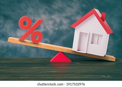 Mortgage Rate Balance Concept, Seesaw With Percent And House. 3d Illustration