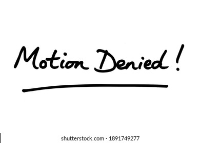 Motion Denied! Handwritten On A White Background.