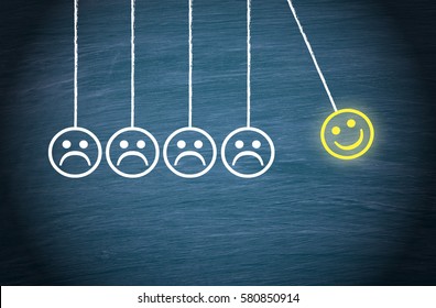 Motivation, Teamwork, Leadership and Coaching Concept - Smiley pendulum on blue background - Powered by Shutterstock