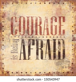 Motivation Text - Courage is being afraid on grunge background