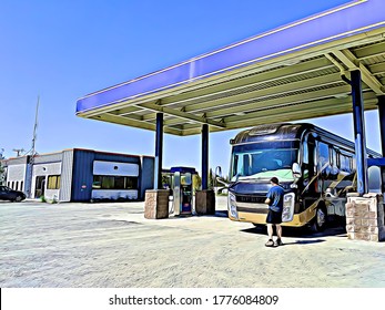 Motorhome (RV) Recreational Vehicles Getting Gas At An Empty Truck Stop