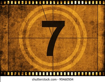 movie film strip with countdown number on grunge background