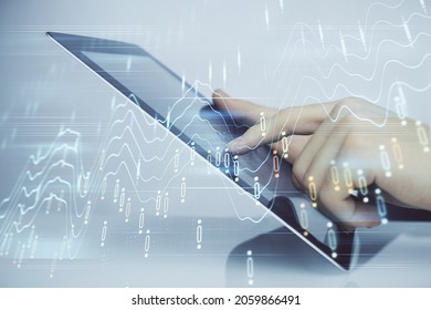 Multi exposure of man's hands holding and using a digital phone and forex graph drawing. Financial market concept.
