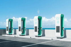 Multiple Electric Vehicle (EV) Charging Stations In A Row, With A Clear Blue Sky And Ocean Background, Concept Of Green Energy Infrastructure. 3D Rendering