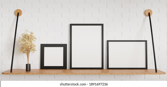 Multiple Size Frame Mockup Standing On The Wall Table 3d Realistic Rendered With Vase Plant For Mockup Background. Empty Frame For Poster, Photo, Banner, Etc.