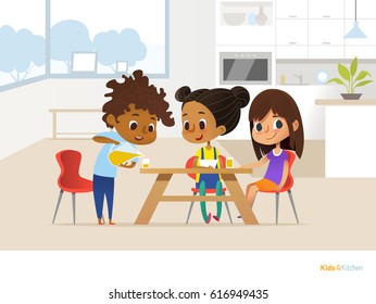 Multiracial Children Preparing Lunch By Themselves And Eating. Two Girls Sitting At Table And Boy Pouring Orange Juice Into Glass. Kids In Dining Room Concept. Illustration For Banner, Website.