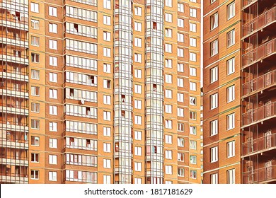 Multi-storey residential building. Background new modern house. Detailed photo of multi-storey residential with large number of Windows. Dormitories for low-income residents of Russia. Architecture