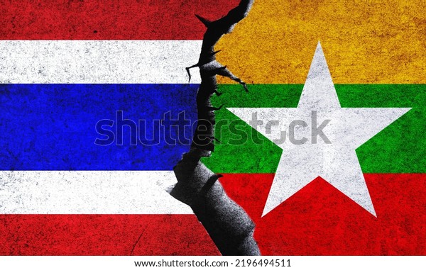 Myanmar vs Thailand flags on a\
wall with a crack. Thailand and Myanmar relation. Thailand and\
Myanmar conflict, war crisis, relation, economy, trade\
concept