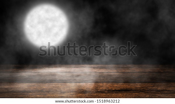 Mystery moon with smoke on\
wooden tabletop. Mystical dark night background for design and\
copyspace.