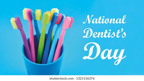 National Dentist's Day images. Colored toothbrushes stock images. Morning hygiene. Bathroom accessories images. Toothbrush on a blue background. March 6, National Dentists Day. Important day - Powered by Shutterstock