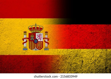 The National Flag Of Germany With Kingdom Of Spain National Flag. Grunge Background