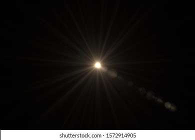 Natural, Sun flare on the black background - Shutterstock ID 1572914905