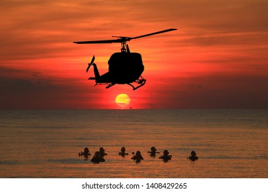  Navy Seal Silhouettes  On Sunrise