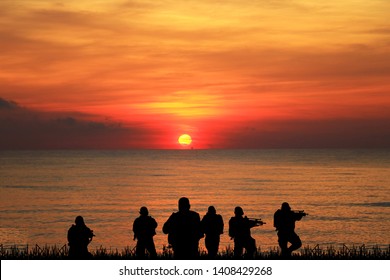  Navy Seal Silhouettes  On Sunrise