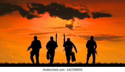  Navy Seal Silhouettes  On Sunrise