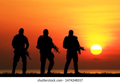  Navy Seal Silhouettes  On Sunrise