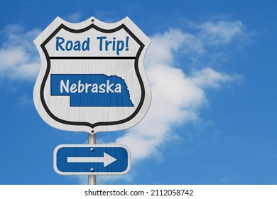 Nebraska Road Trip Highway Sign, Nebraska Map And Text Road Trip On A Highway Sign With Sky 3D Illustration 