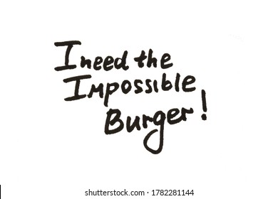 I Need The Impossible Burger! Handwritten Message On A White Background.