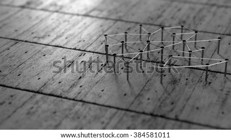 Network, networking, connect, wire. Linking entities. Network of black color wires on grey floor. 