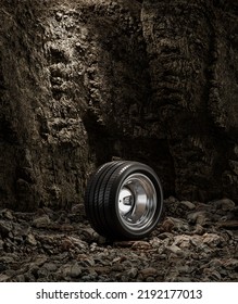 A New Car Wheel Standing On A Rocky Stage. A Car Tire Standing Upright And Sideways On Rocky Ground In Front Of A Natural Cliff. 3d Rendering, No People