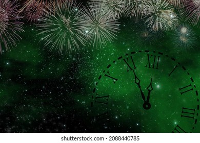 New Year's clock on a green background with fireworks and fireworks.