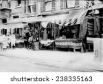 New York City, Italian wares on display in front of shops in Little Italy, circa early 1900s.