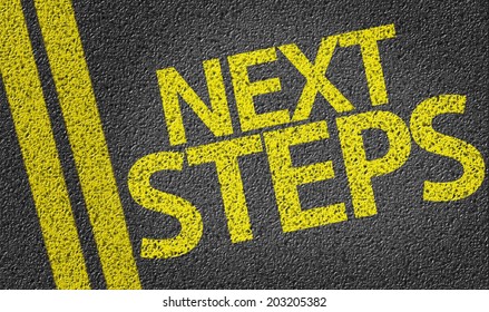 Next Steps Written On The Road