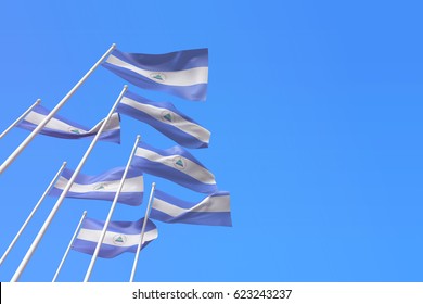 Nicaragua flags waving in the wind against a blue sky. 3D Rendering