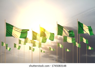 Nice Independence Day Flag 3d Illustration
 - Many Nigeria Flags In A Row On Sunset With Free Space For Text