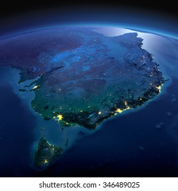 Night planet Earth with precise detailed relief and city lights illuminated by moonlight. Australia and Tasmania. Elements of this image furnished by NASA