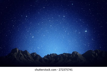 Night Sky Above Rocky Mountains Background