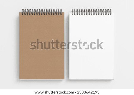 Notebook mockup. Closed and open blank notebook brown paper cover. Spiral notepad on white background. 3d illustration