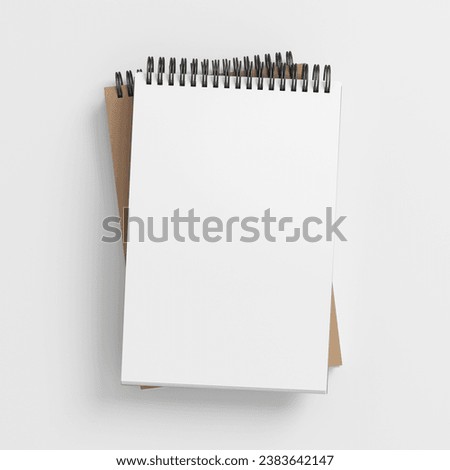 Notebook mockup. Two notebooks in a stack. Spiral notepad on white background. 3d illustration