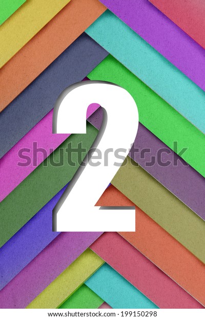 number two on colorful\
paper background