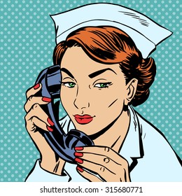 The Nurse At The Reception Desk Talking On The Phone. Uniform Hospital Admissions