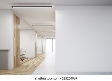 Office corridor with large blank wall and row of conference rooms with wooden wall and floor decoration. 3d rendering. Mock up.