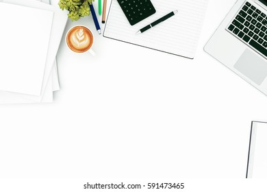 Office desk table with labtop computer,blank magazinesmart phone and coffee cup Top view with copy space,3D rendering