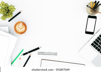 Office Desk Table With Labtop Computer,blank Magazinesmart Phone And Coffee Cup Top View With Copy Space,3D Rendering