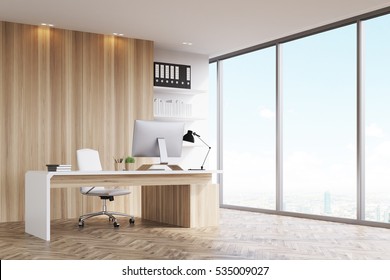 Office Of A Head Of A Company With Light Wood Walls, A Panoramic Window And A Table With Computer On It. 3d Rendering. Mock Up.