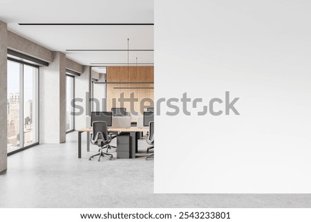 Office interior with pc computers and desks with dividers, concrete floor. Coworking zone with technology and panoramic window on skyscrapers. Mock up empty wall partition. 3D rendering