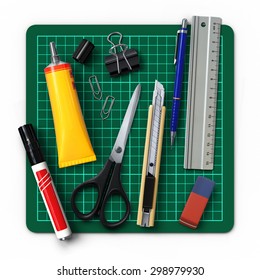 Office stationery tools.Unorganized on a cutting mat.Realistic 3D rendering.Isolated on white background.Top view.