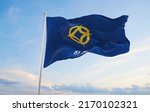 official flag of Jinju city, South Korea at cloudy sky background on sunset, panoramic view. Korean travel and patriot concept. copy space for wide banner. 3d illustration